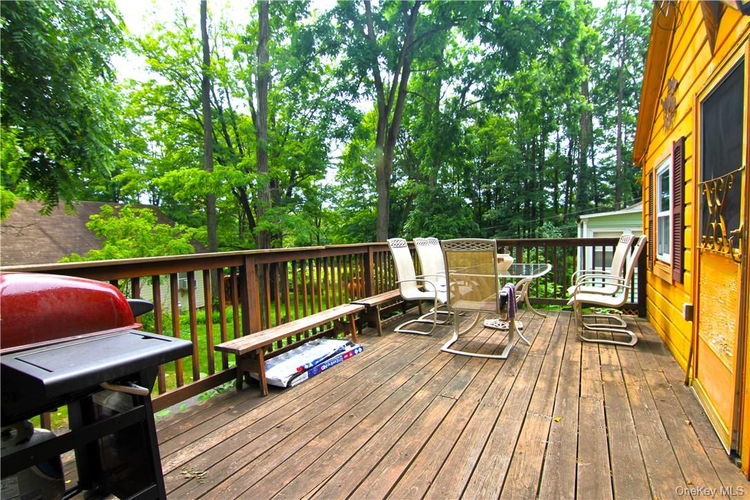 71 Miller Road, Unit 14 Hopewell Junction, NY 12533 - Photo 4 of 21 a view of balcony with wooden floor and seating space