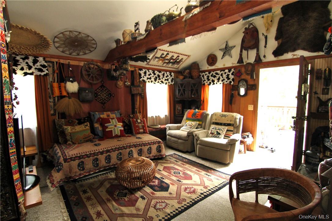 71 Miller Road, Unit 14 Hopewell Junction, NY 12533 - Photo 10 of 21 a living room with furniture and a fireplace