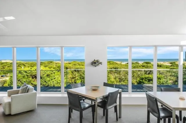 a view of balcony with ocean view