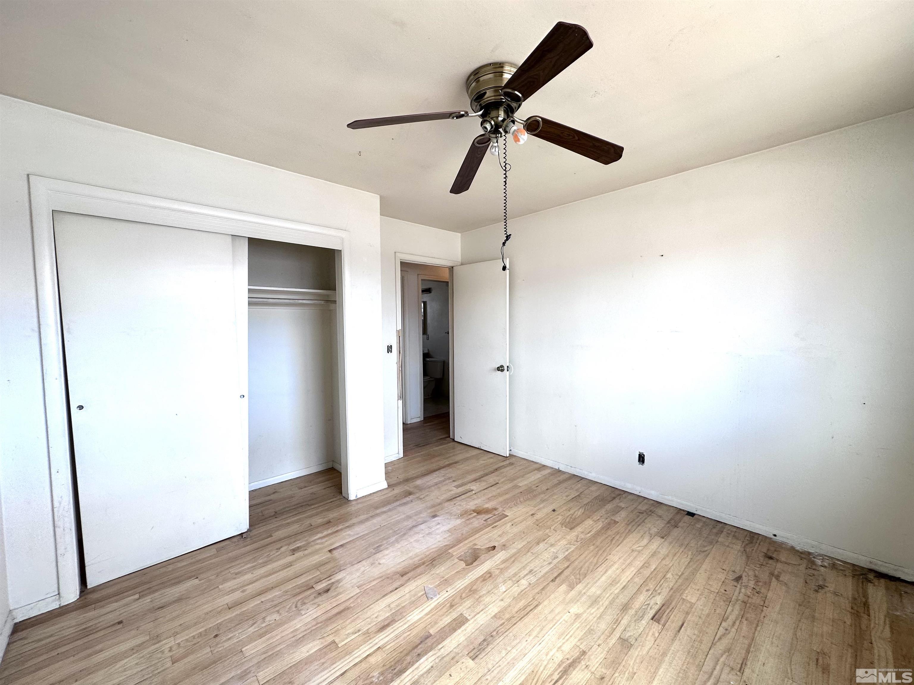 1202 Wilkinson Reno, NV 89503 - Photo 15 of 31 a view of empty room with wooden floor