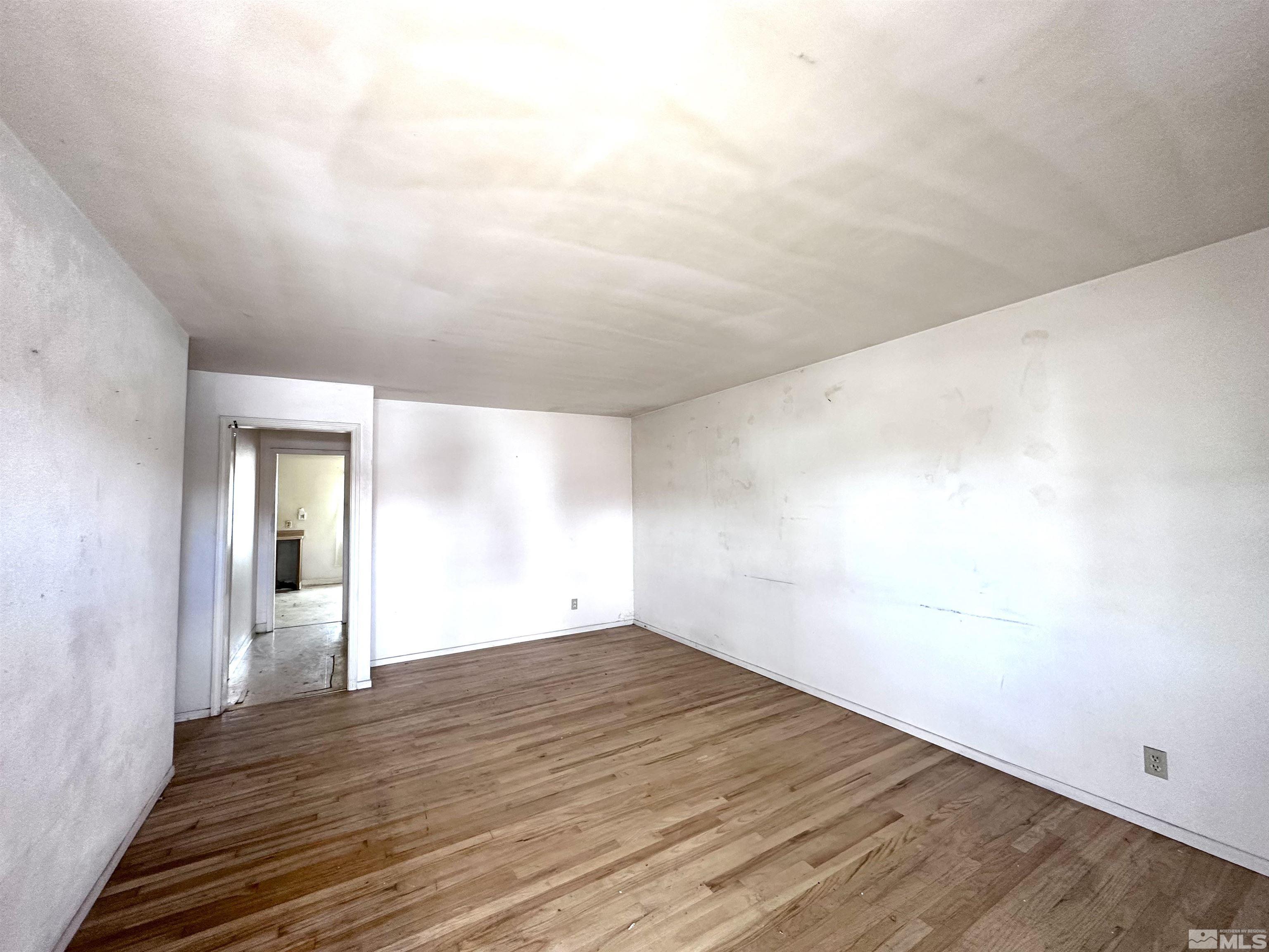 1202 Wilkinson Reno, NV 89503 - Photo 4 of 31 a view of an empty room and wooden floor