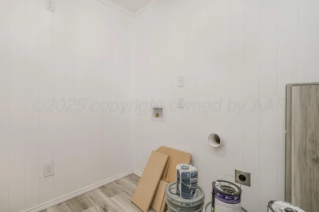 a bathroom with a window and a bathtub