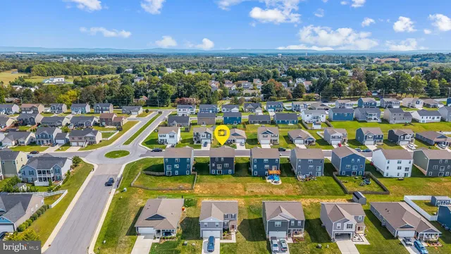a view of a swimming pool with seating area