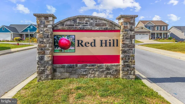 a view of multiple houses with a swimming pool