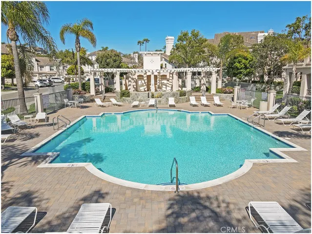 a view of a patio with table and chairs and potted plants