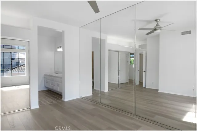 a view of a bathroom with tub and shower