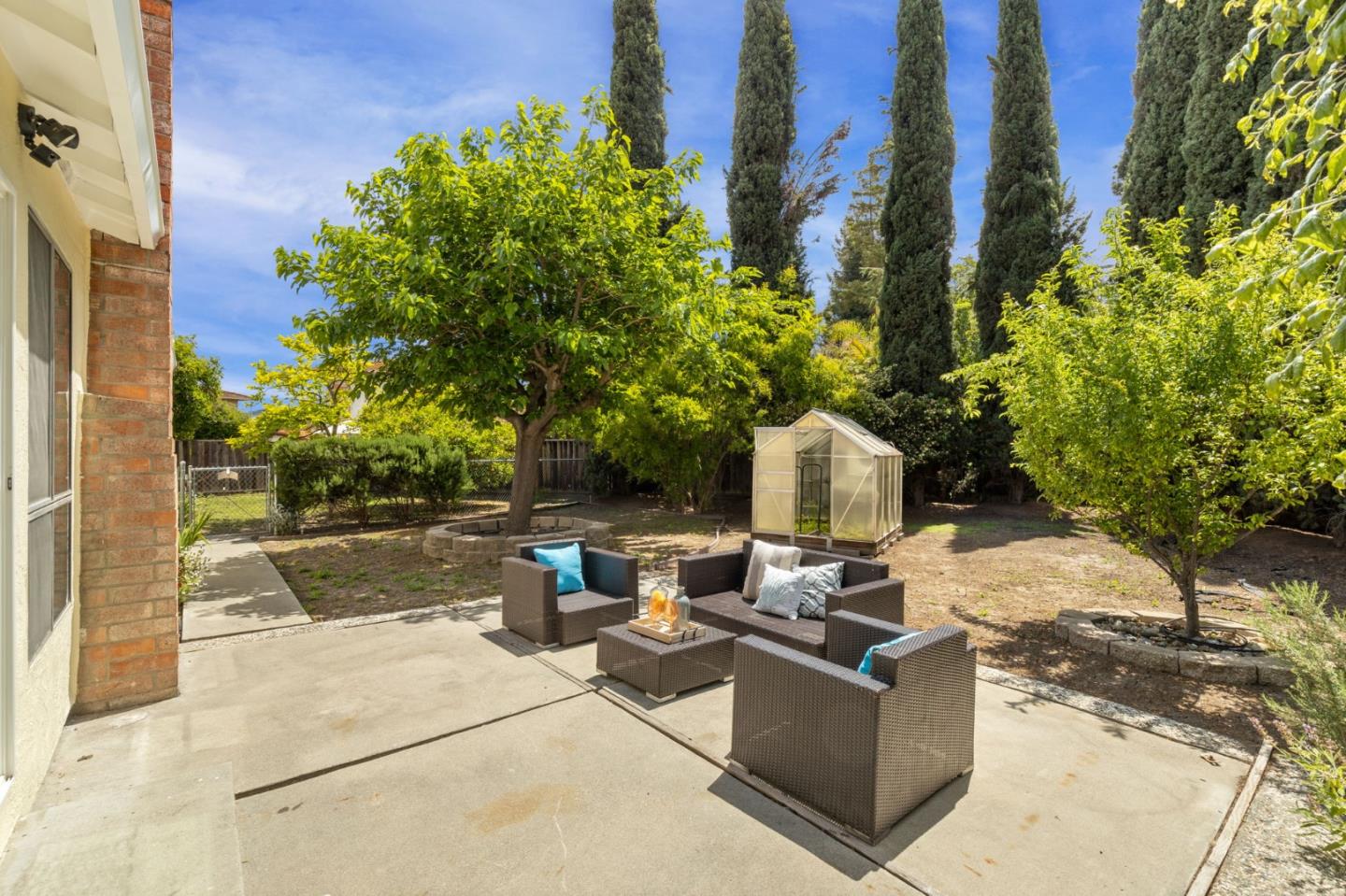 Cadburry Court San Jose, CA 95123 - Photo 21 of 25 a view of a backyard with sitting area