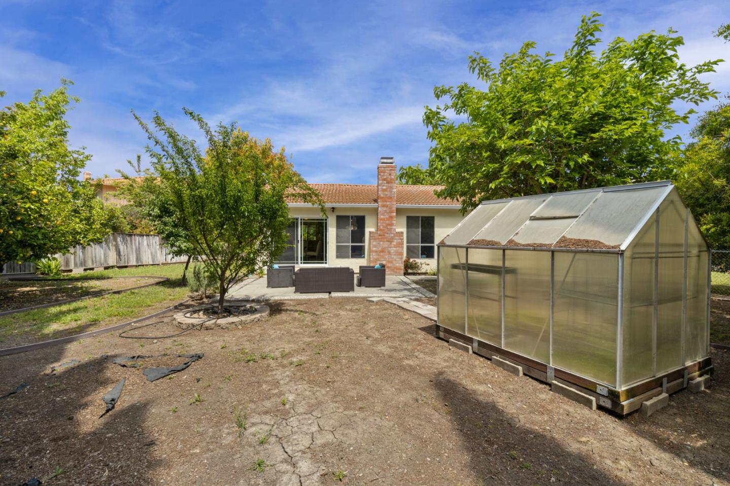 Cadburry Court San Jose, CA 95123 - Photo 23 of 25 a view of a house with backyard and a tree