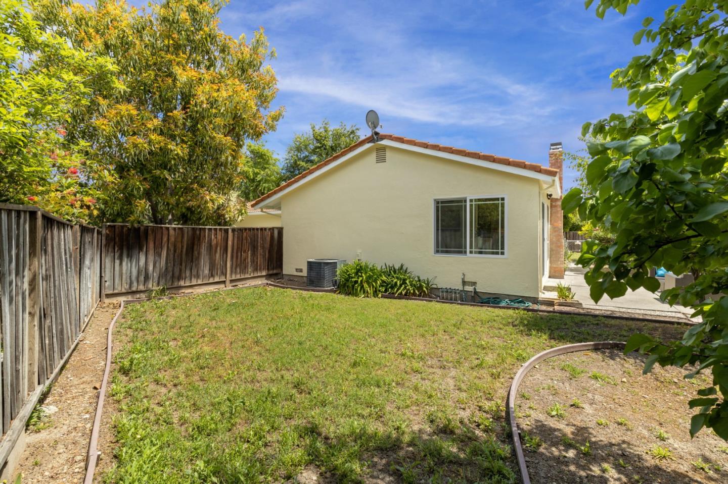 Cadburry Court San Jose, CA 95123 - Photo 25 of 25 a view of backyard of house with green space