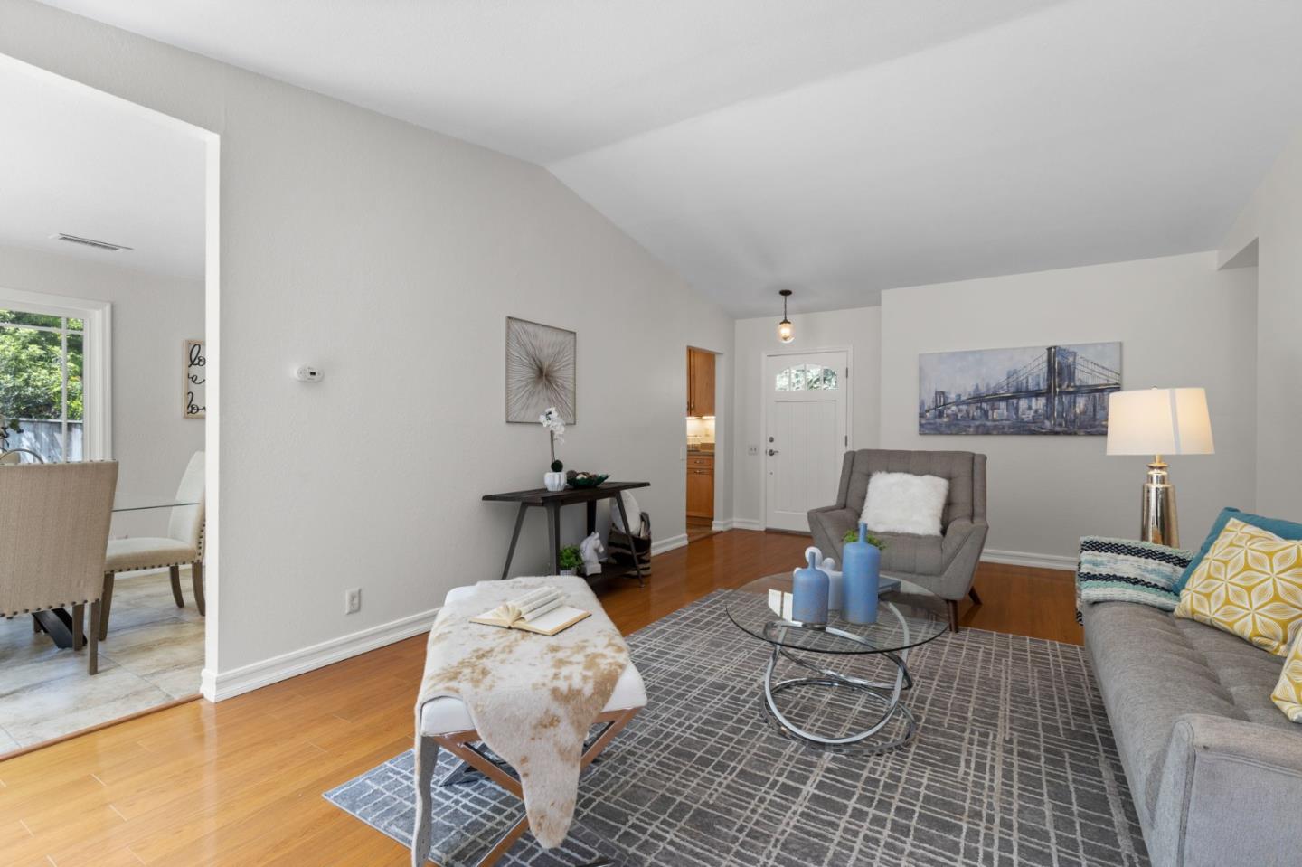 Cadburry Court San Jose, CA 95123 - Photo 7 of 25 a living room with furniture a dining table and wooden floor