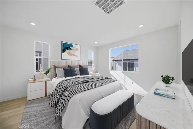 a bed room with a bed and a couch