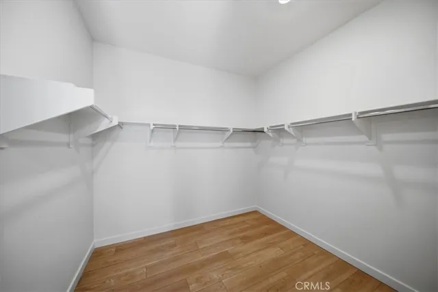 a view of a room with shelf on the wall