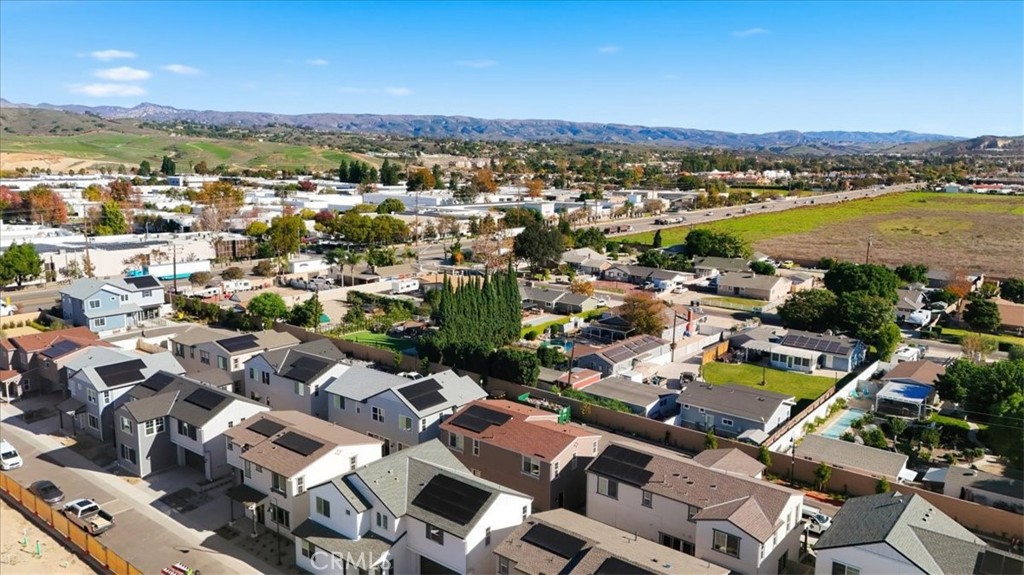 4841 East Beltramo Ranch Road Moorpark, CA 93021 - Photo 30 of 38 a view of a city with mountains in the background