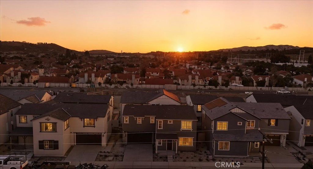 4841 East Beltramo Ranch Road Moorpark, CA 93021 - Photo 32 of 38 a view of a town with mountains in the background