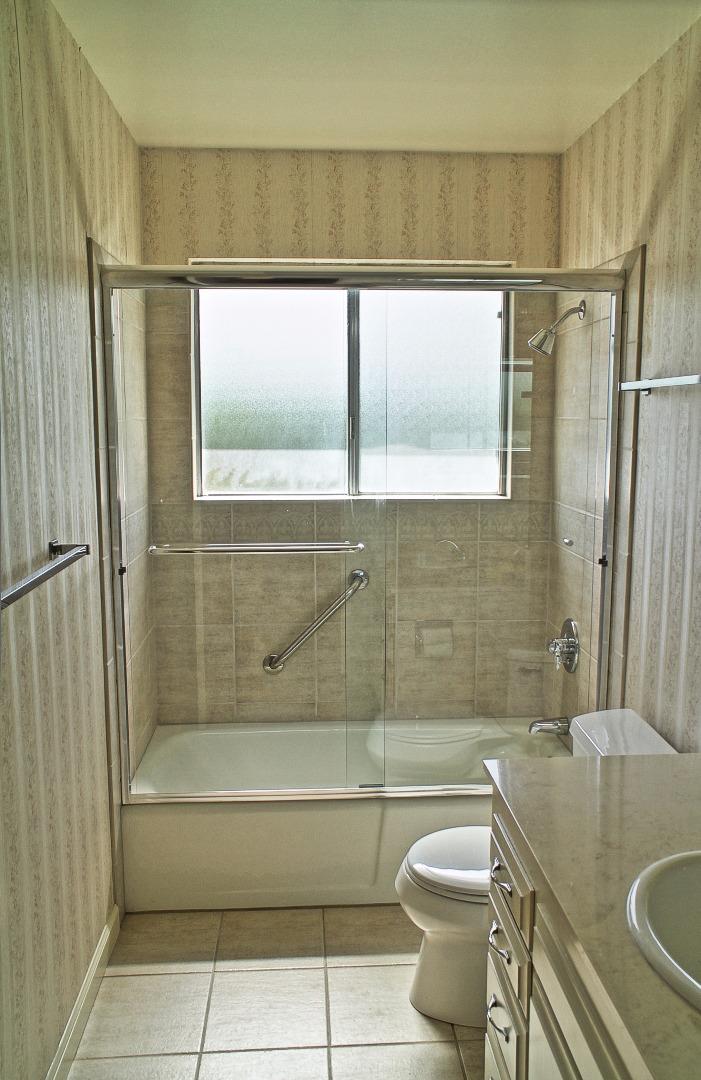 3035 Sloat Road Pebble Beach, CA 93953 - Photo 14 of 16 a bathroom with a sink a toilet and shower