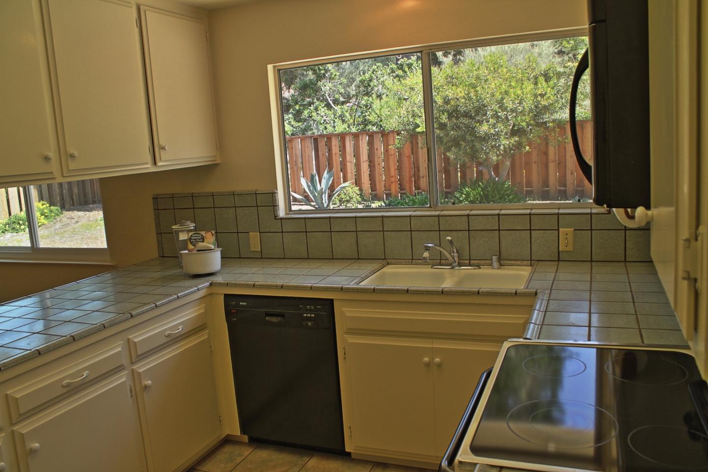 3035 Sloat Road Pebble Beach, CA 93953 - Photo 16 of 16 a utility room with washer and dryer