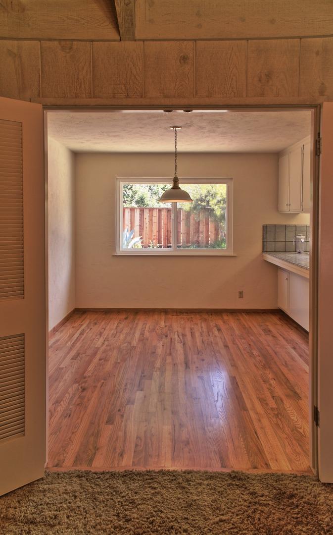 3035 Sloat Road Pebble Beach, CA 93953 - Photo 10 of 16 a view of empty room with wooden floor