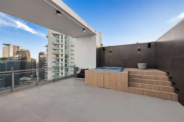 a view of a building with a glass door