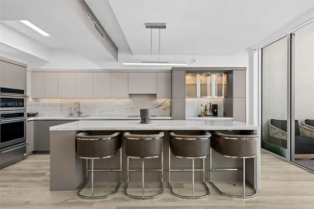 a view of a balcony with an outdoor seating