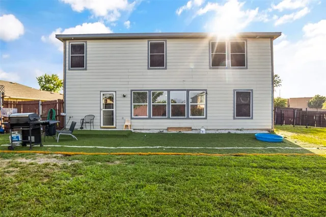 a view of a house with a swimming pool