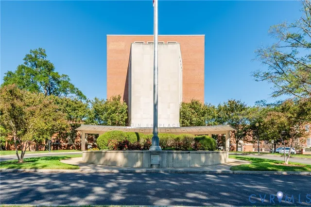 a view of a swimming pool with a yard