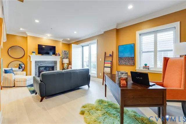a living room with furniture and a table