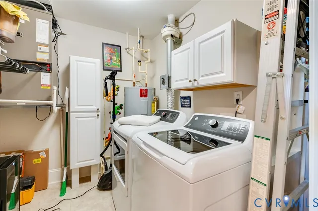 a bedroom with a bed and cabinets