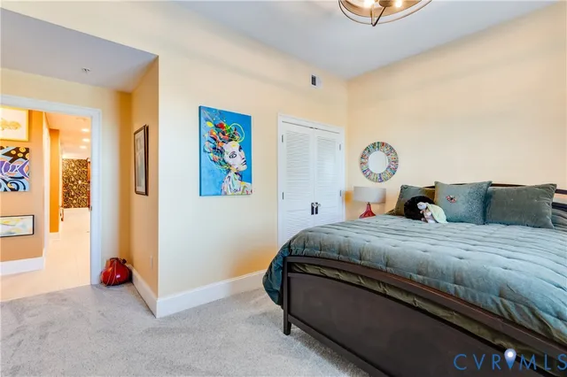 a bathroom with a sink a large mirror and a window