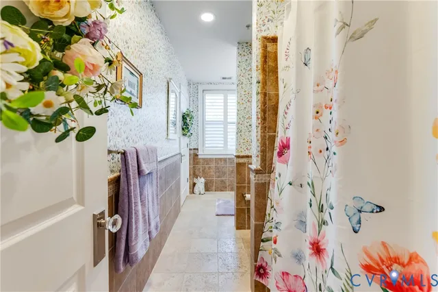 a view of swimming pool from a balcony