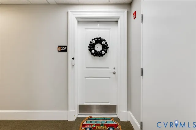 a view of hallway with closet