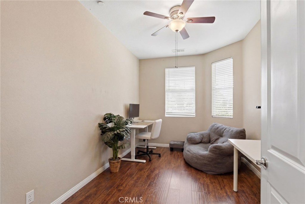 32634 Ritchart Court Temecula, CA 92592 - Photo 9 of 22 a living room with furniture and a wooden floor