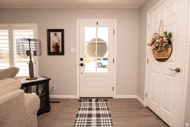 340 West 100 N Street Beaver, UT 84713 - Photo 8 of 37 Foyer featuring light wood-type flooring and baseboards