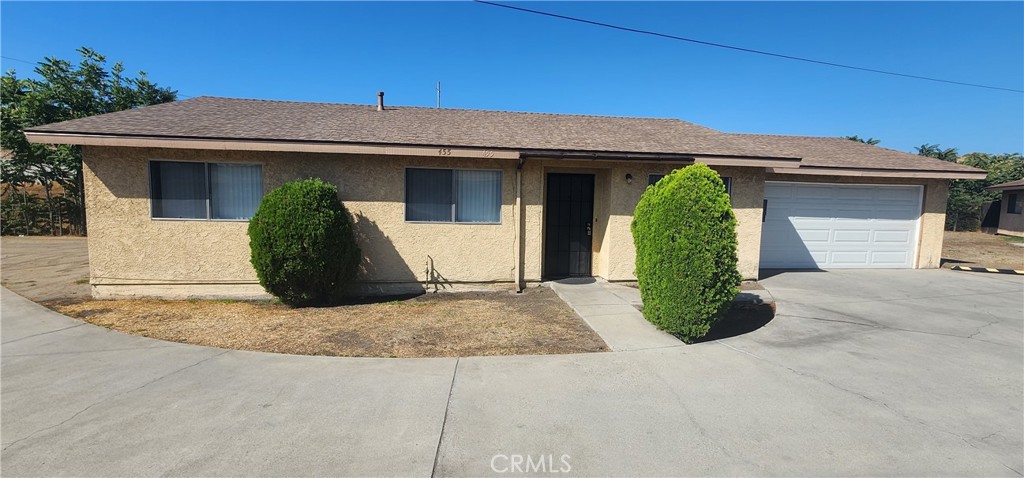 455 West Duell Street Azusa, CA 91702 - Photo 1 of 13 a front view of a house with garden