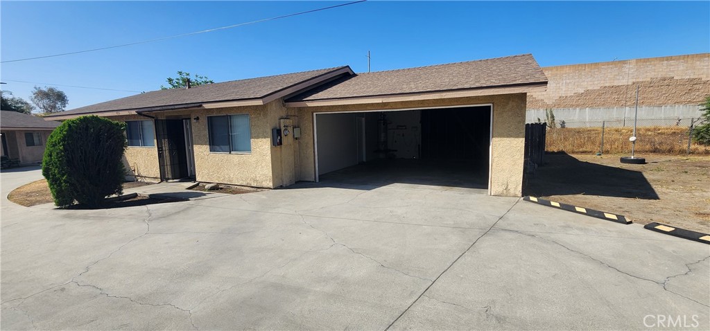 455 West Duell Street Azusa, CA 91702 - Photo 12 of 13 a view of a house with a garage