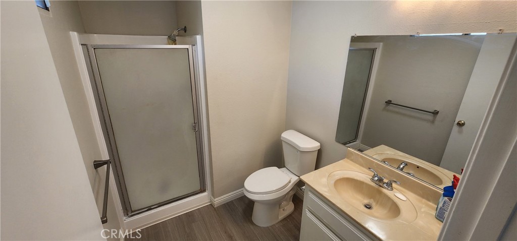 455 West Duell Street Azusa, CA 91702 - Photo 10 of 13 a white toilet sitting next to a bathroom sink