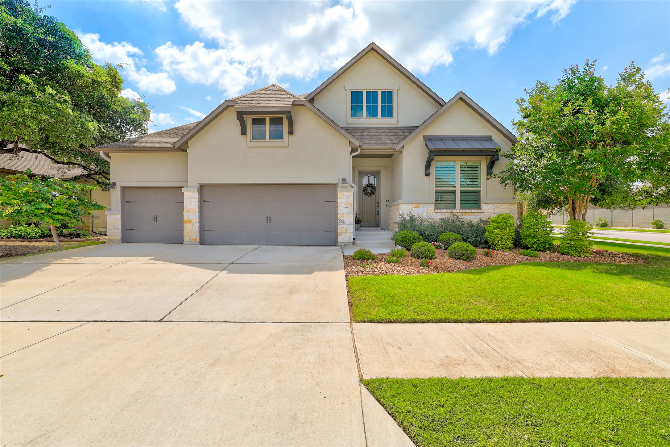 400 Canyon View Road Georgetown, TX 78628 - Photo 1 of 1 Front view of home with 3 car garage and all sides masonry