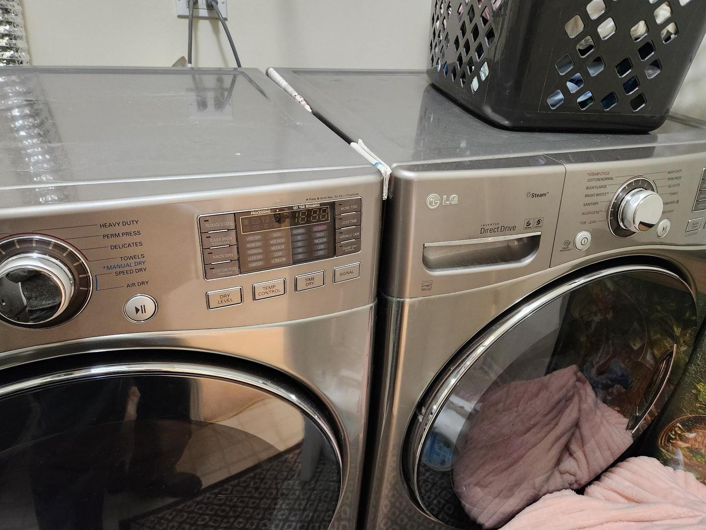 670 Mill Circle, Unit 305 Wheeling, IL 60090 - Photo 14 of 16 a utility room with dryer and washer