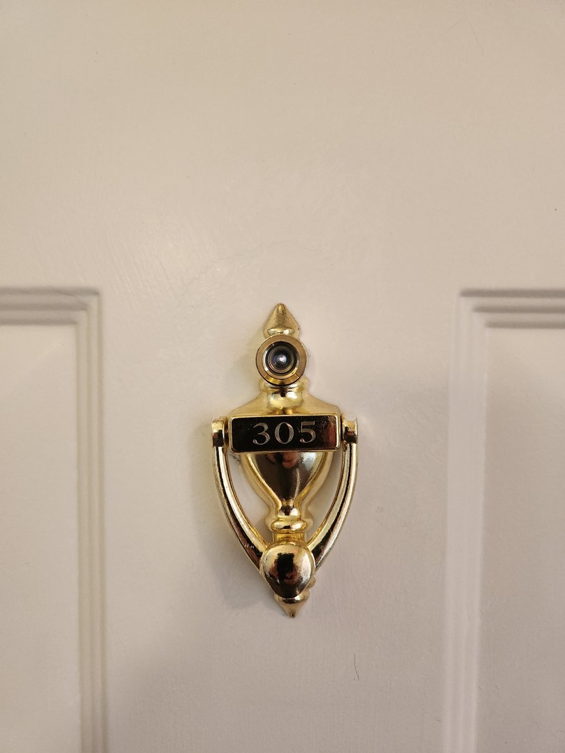 670 Mill Circle, Unit 305 Wheeling, IL 60090 - Photo 3 of 16 a car parked in a room