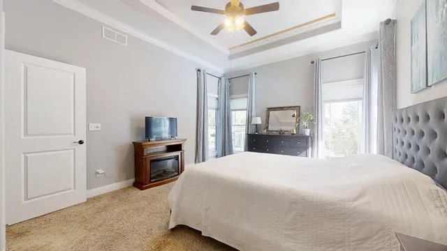 a bathroom with a shower a toilet and a sink