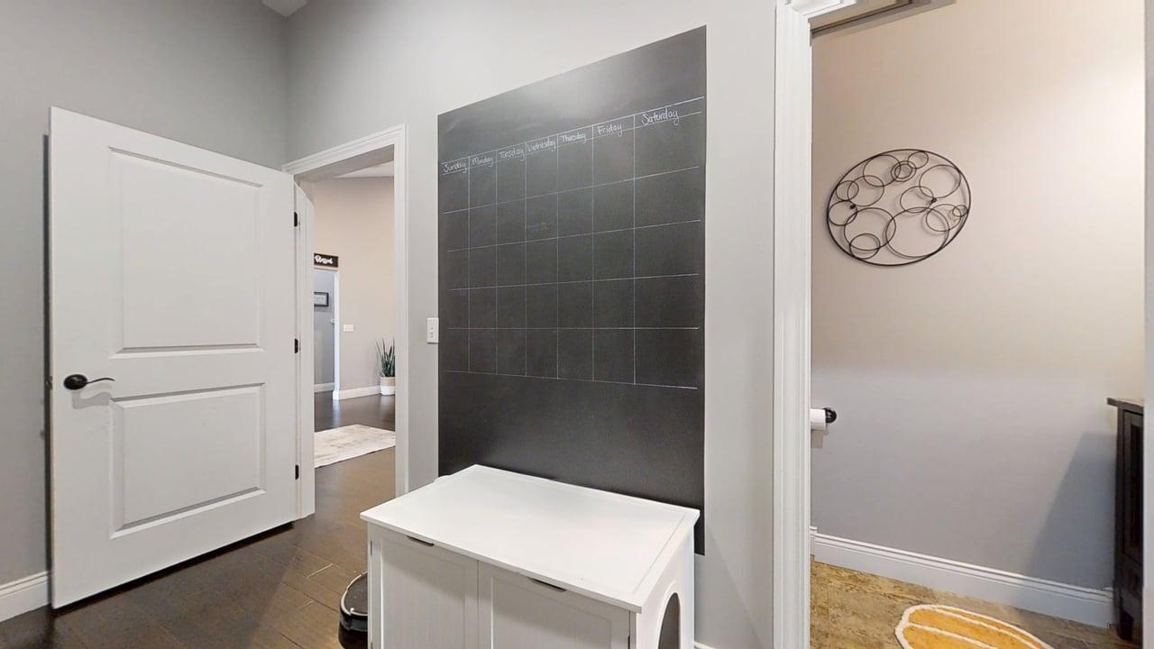 2112 Slade Lane Mahomet, IL 61853 - Photo 27 of 68 a bathroom with a shower a toilet and a sink