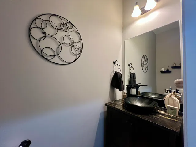 a living room with furniture fireplace and flat screen tv