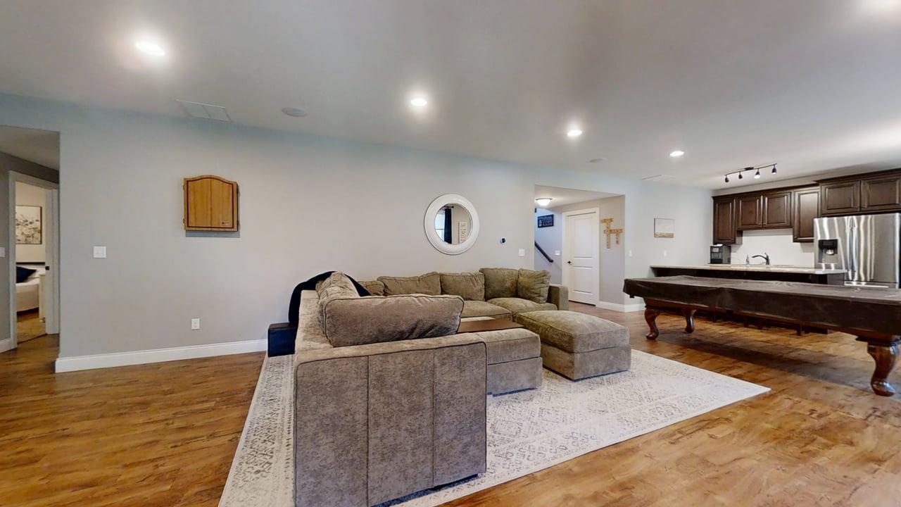 2112 Slade Lane Mahomet, IL 61853 - Photo 43 of 68 a living room with furniture and a wooden floor