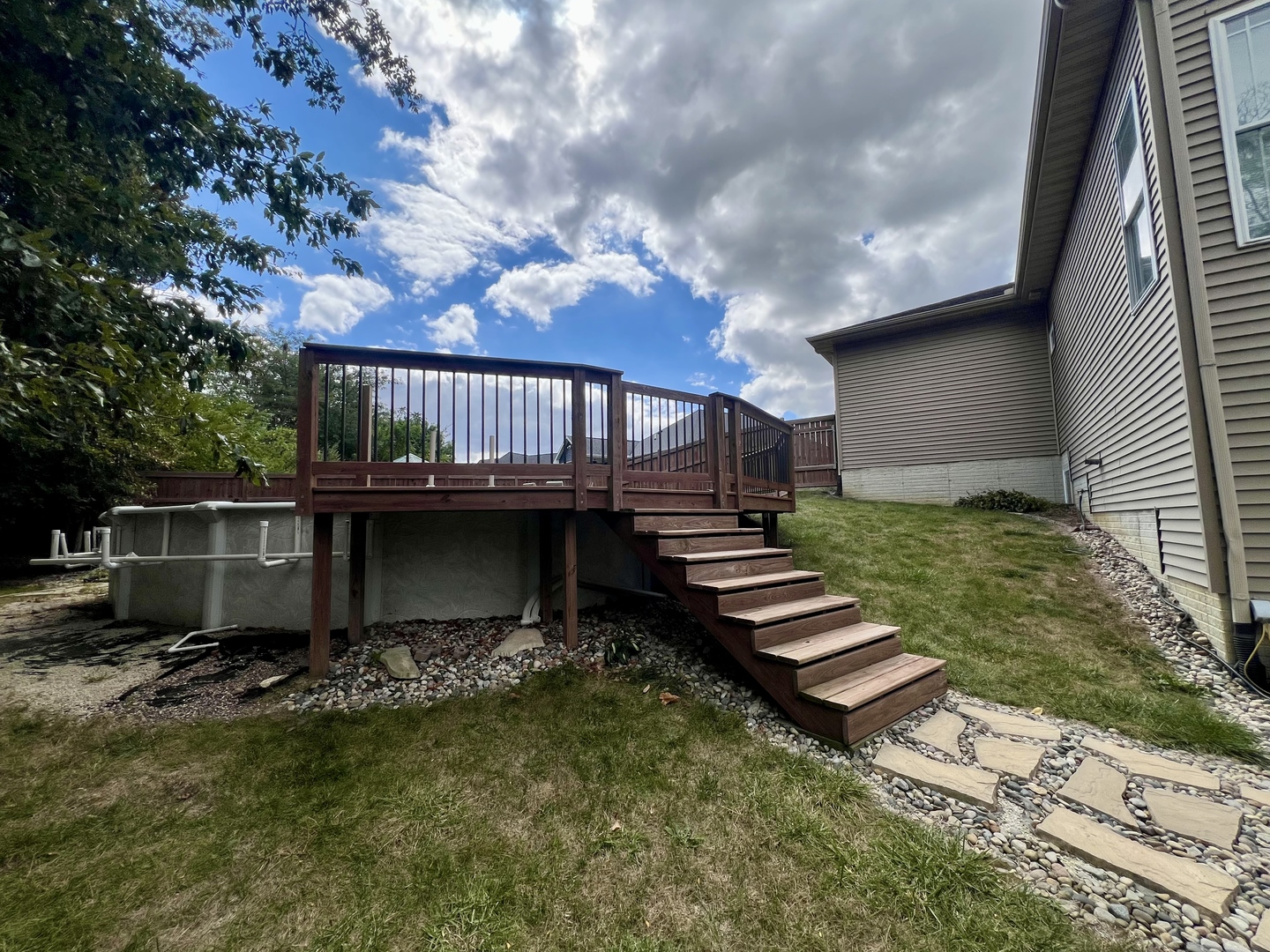 2112 Slade Lane Mahomet, IL 61853 - Photo 65 of 68 a view of a house with backyard and sitting area