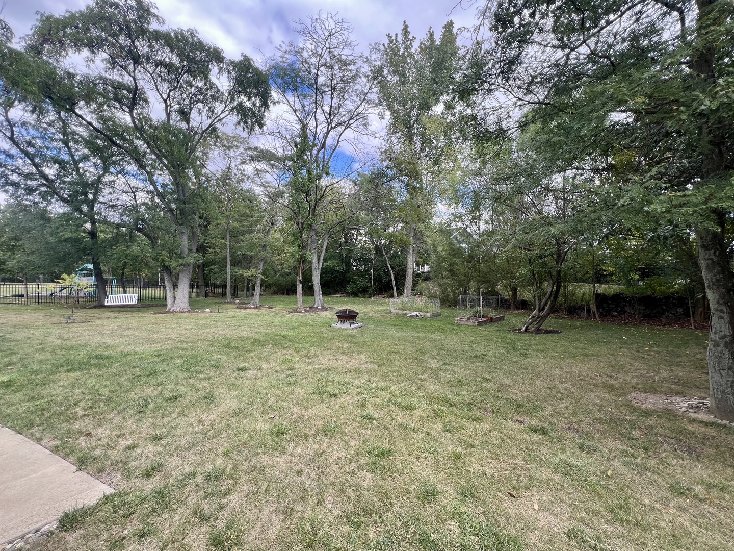 2112 Slade Lane Mahomet, IL 61853 - Photo 67 of 68 a view of outdoor space with deck and yard