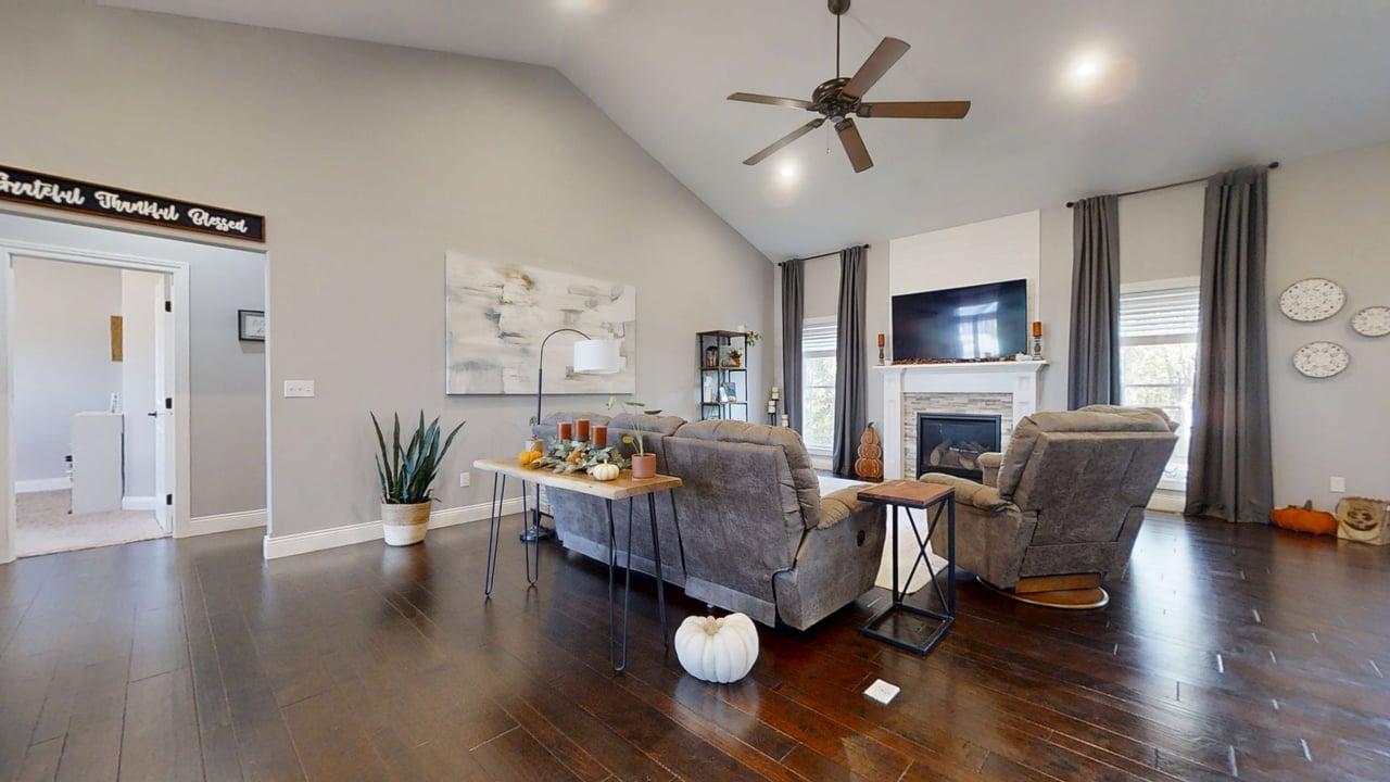 2112 Slade Lane Mahomet, IL 61853 - Photo 8 of 68 a living room with furniture and a wooden floor