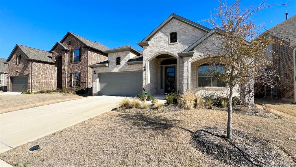 5304 Babcock Road McKinney, TX 75071 - Photo 2 of 27 a front view of a house with a yard