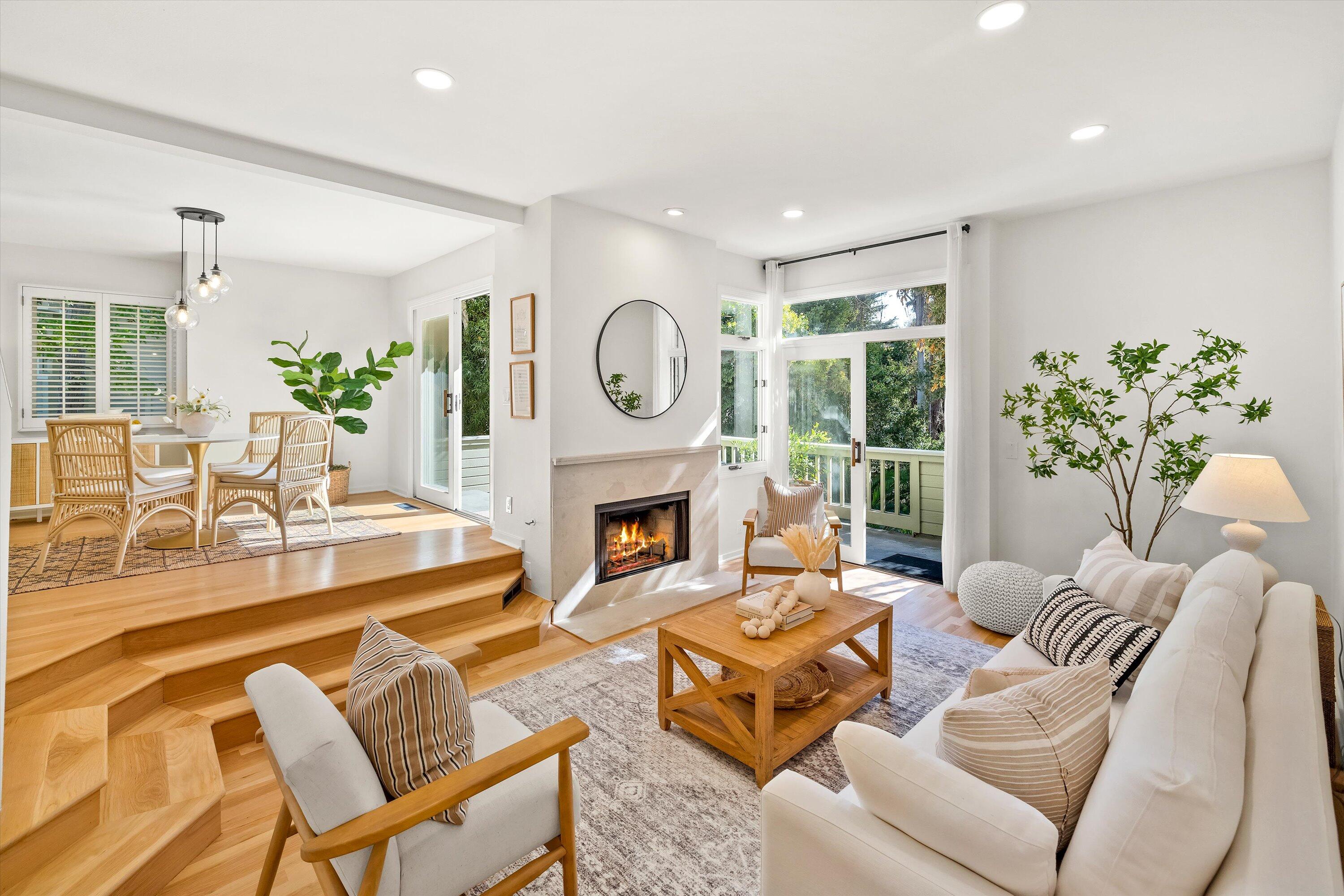 931 Weldon Road Santa Barbara, CA 93109 - Photo 32 of 32 a living room with furniture a fireplace and a large window