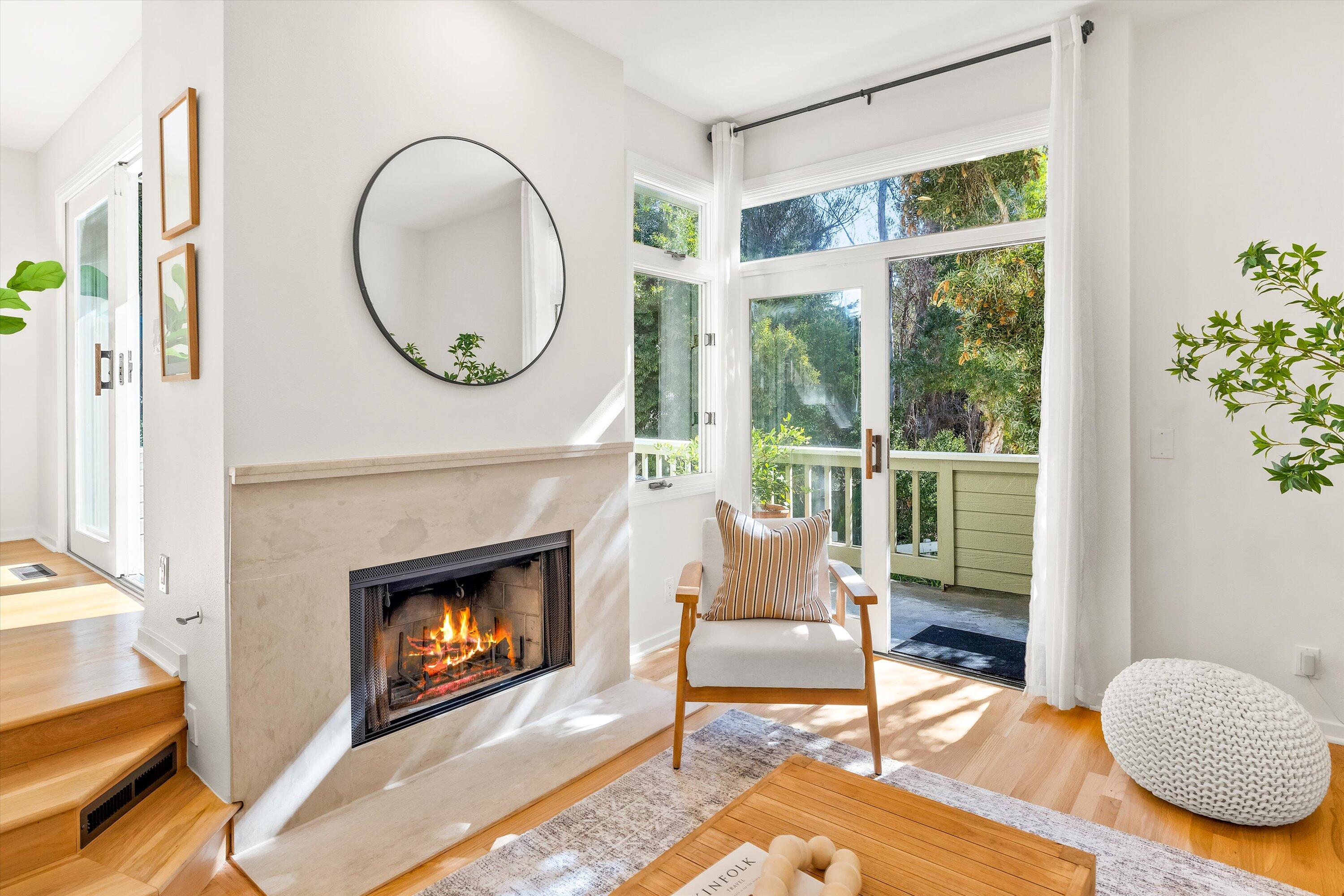 931 Weldon Road Santa Barbara, CA 93109 - Photo 11 of 32 a living room with furniture and a fireplace