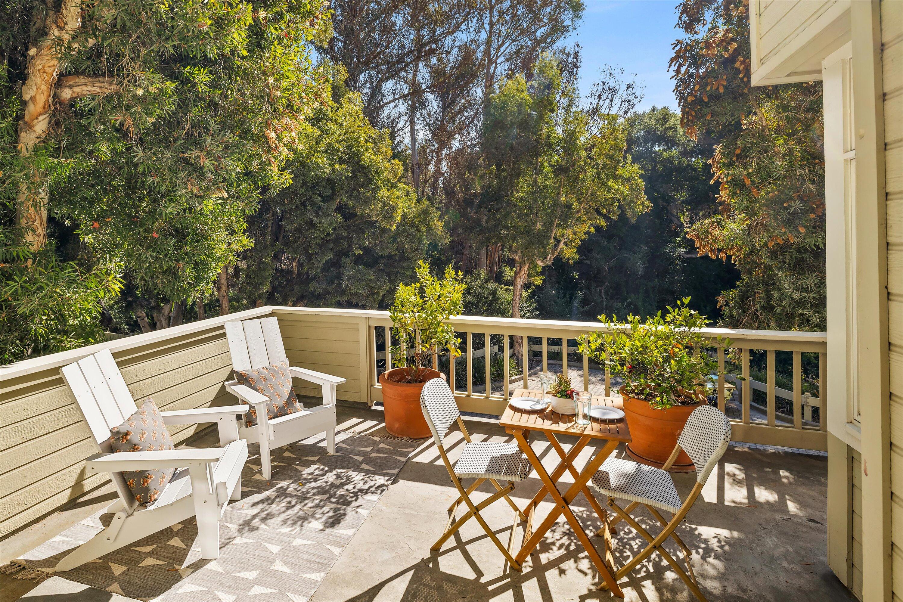 931 Weldon Road Santa Barbara, CA 93109 - Photo 12 of 32 a view of a chairs and table on the roof deck