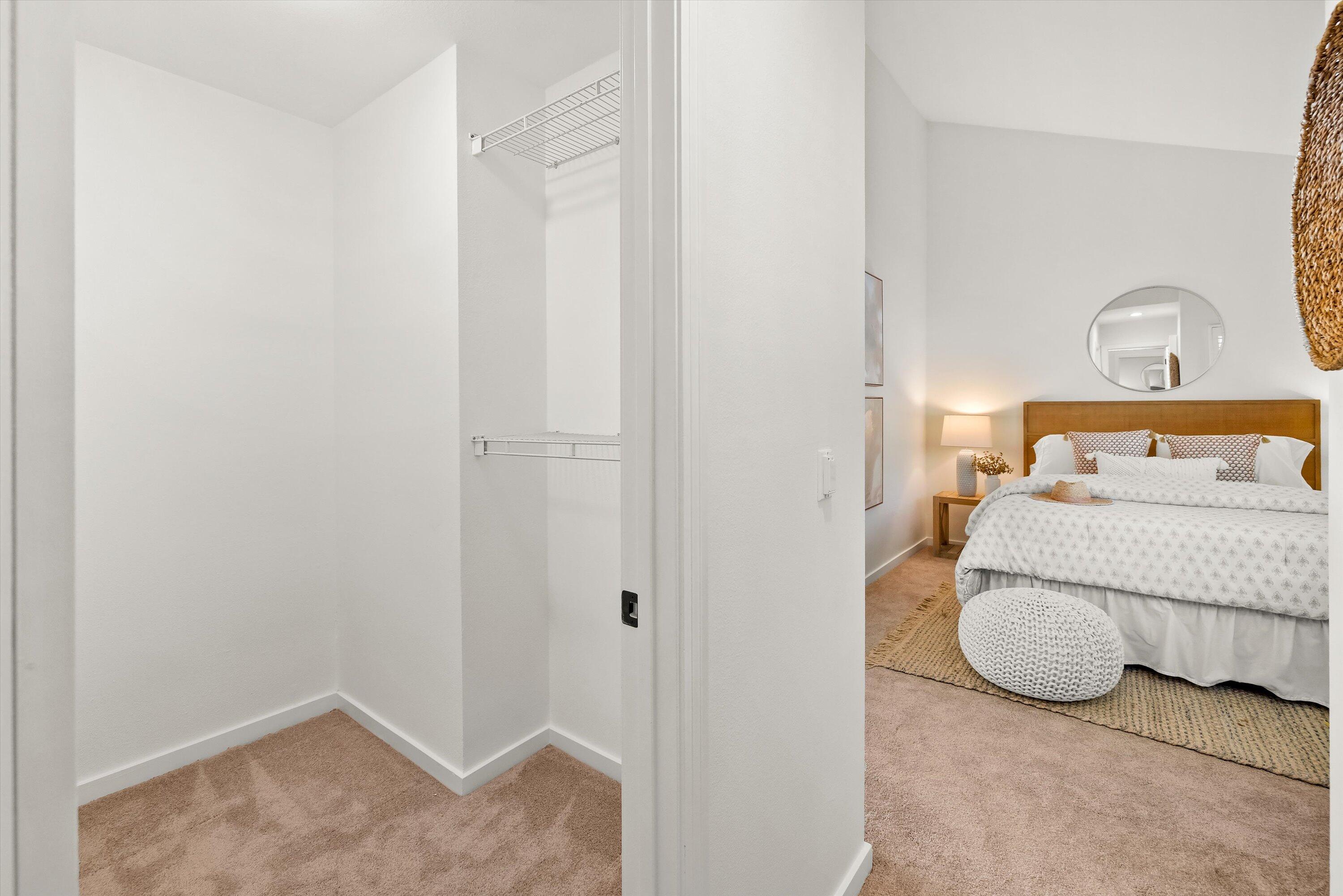 931 Weldon Road Santa Barbara, CA 93109 - Photo 18 of 32 a bedroom with a bed and a window